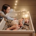how to keep baby from rolling over in crib