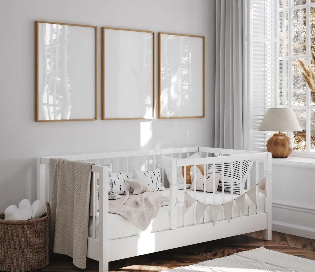 is it safe to hang pictures above a crib?