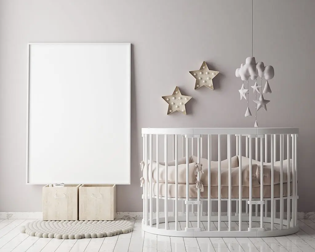 is it safe to hang pictures above a crib