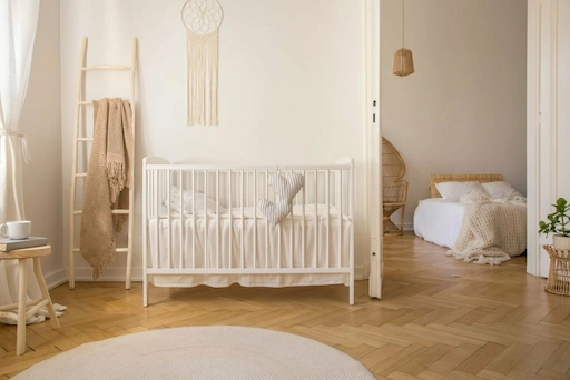 why should crib be away from the wall?